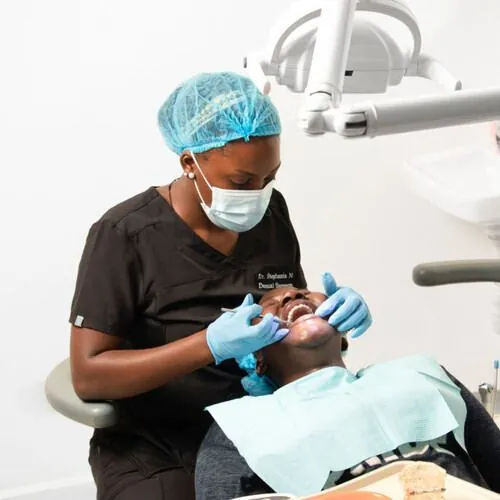 Fluoride and desensitising treatment for sensitive teeth at M Dental Care, Kampala